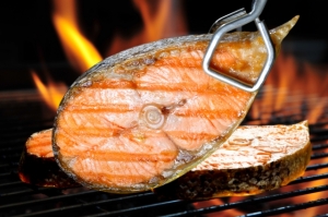 Grilled salmon needs to be cooked to the proper temperature to ensure safety.